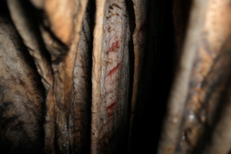 red ocher markings which were painted on stalagmites by neanderthals about 65 000 years ago according to an international study are seen in a prehistoric cave in ardales southern spain august 7 2021 photo reuters