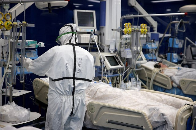 a medic tends to coronavirus disease covid 19 patients at the intensive care unit icu of pirogov hospital in sofia bulgaria october 15 2021 photo reuters