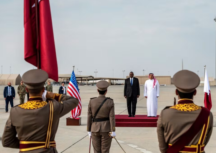 us secretary of defense lloyd austin is welcomed by qatar s minister of defense khalid bin mohammad al attiyah during his visit to al udeid air base doha qatar december 19 2023 sarah williams u s air force handout via photo reuters