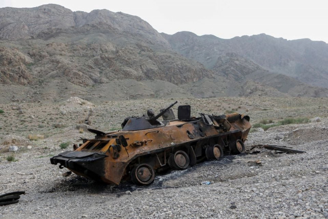 a view shows a burnt armoured personnel carrier of kyrgyz forces near golovnoi water distribution facility outside the village of kok tash in batken province kyrgyzstan may 5 2021 the clashes broke out last week along the frontier between tajikistan s sughd province and kyrgyzstan s southern batken province because of a dispute over a reservoir and pump claimed by both sides on the isfara river reuters vladimir pirogov file photo a view shows a burnt armoured personnel carrier of kyrgyz forces near golovnoi water distribution facility outside the village of kok tash in batken province kyrgyzstan may 5 2021 the clashes broke out last week along the frontier between tajikistan s sughd province and kyrgyzstan s southern batken province because of a dispute over a reservoir and pump claimed by both sides on the isfara river reuters vladimir pirogov file photo