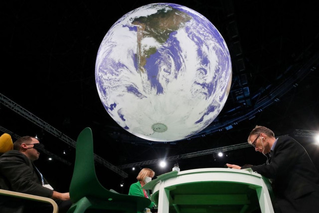 delegates rest during the un climate change conference cop26 in glasgow scotland britain november 12 2021 photo reuters delegates rest during the un climate change conference cop26 in glasgow scotland britain november 12 2021 photo reuters