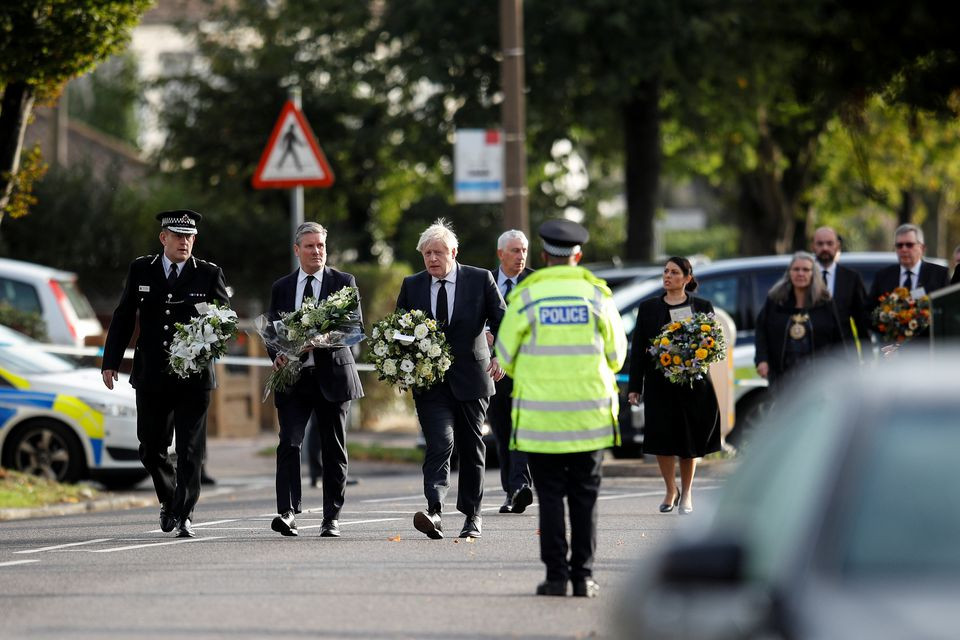 Photo of UK PM Johnson visits church where lawmaker was stabbed to death