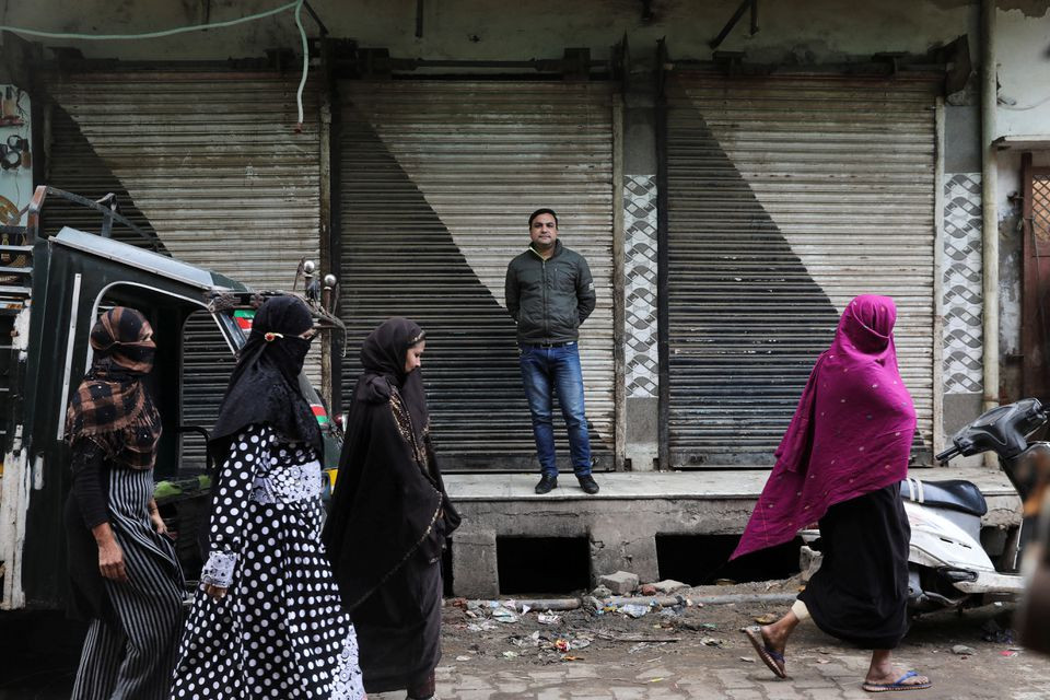 sajid anwar poses for a picture outside his shuttered labbaik restaurant in mathura town in the northern state of uttar pradesh india january 24 2022 reuters