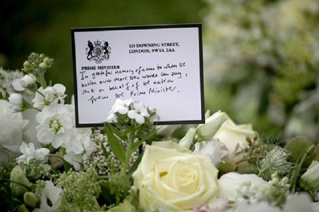A wreath sent by Britain's Prime Minister Boris Johnson sits among the flowers outside St George's Chapel, following the death of Britain's Prince Philip, the Duke of Edinburgh at the age of 99, at Windsor Castle, Berkshire, Britain April 16, 2021. PHOTO: REUTERS