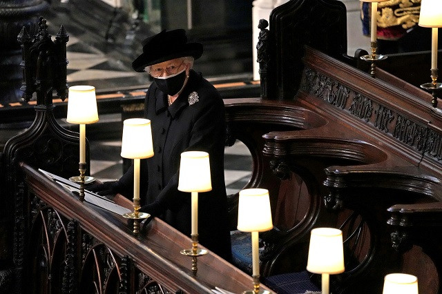 britain s queen elizabeth is seen during the funeral of britain s prince philip husband of queen elizabeth who died at the age of 99 at st george s chapel in windsor britain april 17 2021 photo reuters