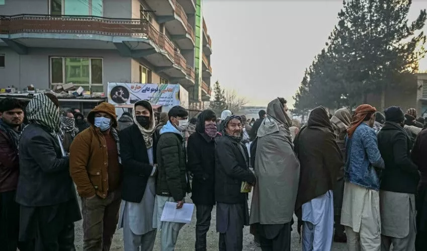 afghans line up near kabul s main passport office after it resumed issuing passports on december 19 photo afp afghans line up near kabul s main passport office after it resumed issuing passports on december 19 photo afp