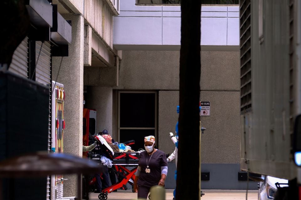 emergency medical technicians emt arrive with a patient to jackson health center where the coronavirus disease covid 19 patients are treated in miami florida u s july 14 2020 photo reuters