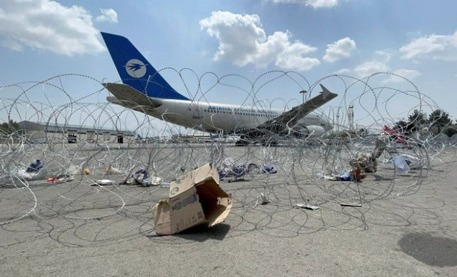a commercial airplane is seen at the hamid karzai international airport a day after u s troops withdrawal in kabul afghanistan august 31 2021 photo reuters a commercial airplane is seen at the hamid karzai international airport a day after u s troops withdrawal in kabul afghanistan august 31 2021 photo reuters