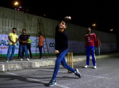 pakistan street cricket comes to life after dark during ramadan