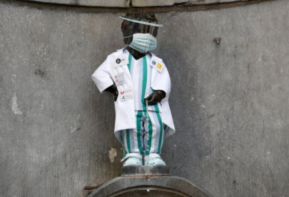 brussels honours health workers by dressing up famous statue brussels honours health workers by dressing up famous statue