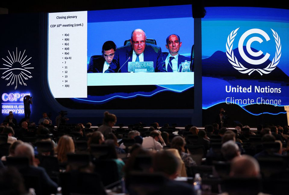 a screen shows cop27 president sameh shoukry delivering a statement during the closing plenary at the cop27 climate summit in red sea resort of sharm el sheikh egypt november 20 2022 reuters mohamed abd el ghany