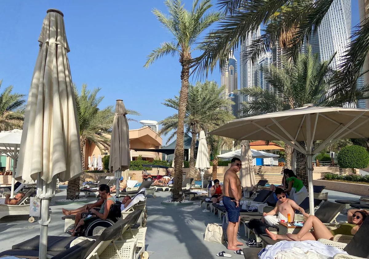 tourists rest at the habtoor grand resort in dubai united arab emirates february 1 2022 reuters abdel hadi ramahi tourists rest at the habtoor grand resort in dubai united arab emirates february 1 2022 reuters abdel hadi ramahi
