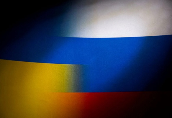 russia s and ukraine s flags are seen printed on paper in this illustration taken january 27 2022 photo reuters