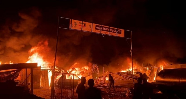 fire rages following an israeli strike on an area designated for displaced palestinians in rafah in the southern gaza strip may 26 2024 photo reuters fire rages following an israeli strike on an area designated for displaced palestinians in rafah in the southern gaza strip may 26 2024 photo reuters