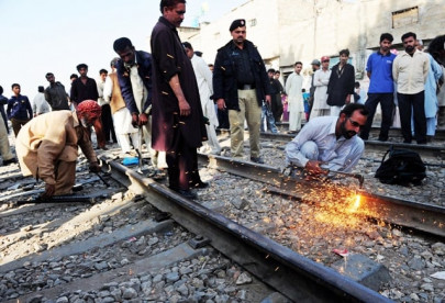 twin blasts damage railway tracks in karachi