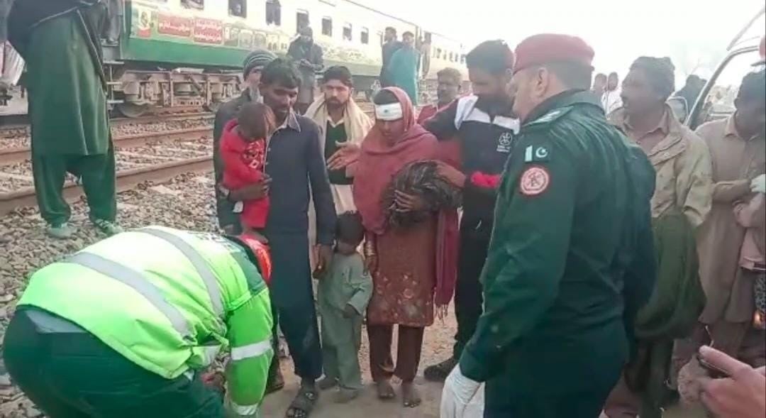 police rescuers help victims of jaffar express blast at the chichawatni railway station photo express