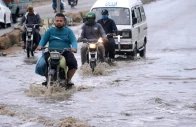 vehicles passing through rain water at karachi s korangi road on april 14 2024 photo app
