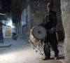 lal hussain 66 ramazan drummer beats his drum as he makes calls at doors at bani an old residential area in rawalpindi photo afp