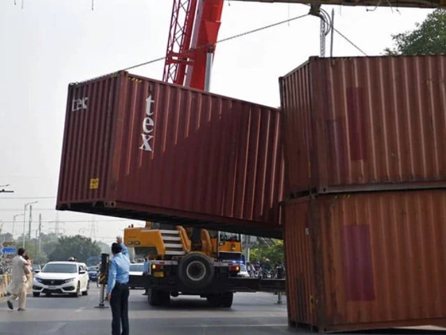 district admin starts erecting blockades on main thoroughfares ahead of pti s long march photo file district admin starts erecting blockades on main thoroughfares ahead of pti s long march photo file