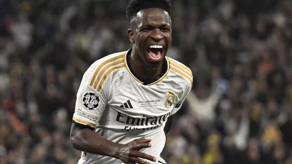 vinicius junior scored real madrid s second goal as they beat borussia dortmund 2 0 to win the champions league photo afp vinicius junior scored real madrid s second goal as they beat borussia dortmund 2 0 to win the champions league photo afp