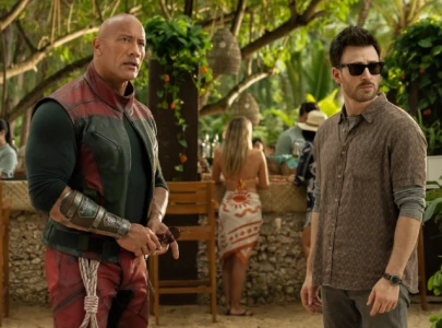 red one review action packed holiday fantasy that lacks christmas spirit