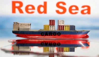 a cargo ship boat model is seen in front of red sea words in this illustration taken january 9 2024 photo reuters