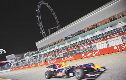 red hot vettel sets the pace in singapore