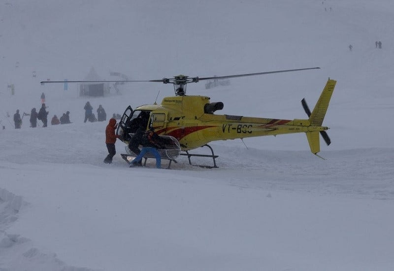 a rescue team pick up a trolley from a helicopter to airlift the body of a foreign skier in the ski resort of gulmarg in iiojk february 22 2024 photo reuters