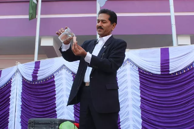 iqbal hussain performing magic trick at an event photo express file iqbal hussain performing magic trick at an event photo express file