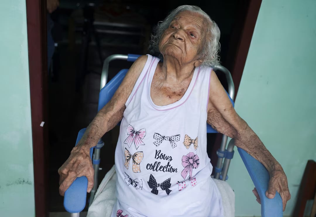 Pictured in her home. Reuters.