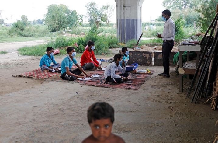 pal s open air classroom where he teaches children in their early teens photo reuters