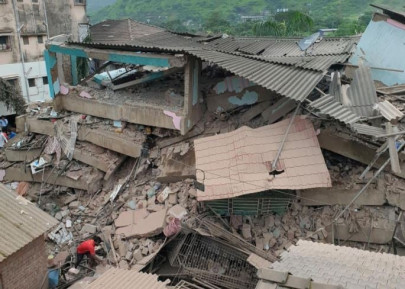 at least 100 feared trapped in building collapse south of mumbai at least 100 feared trapped in building collapse south of mumbai
