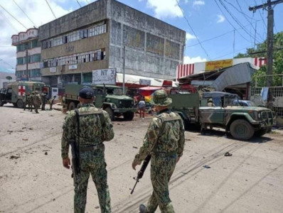 twin bombings kill 15 wound scores in philippine south