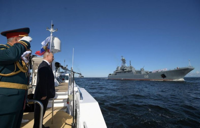 russian president was st petersburg at an annual naval parade that showcases russia s best ships nuclear submarines and naval aviation photo reuters