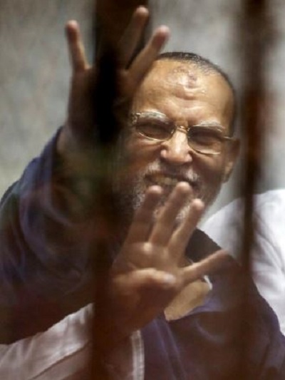 deputy head of the freedom and justice party essam el erian gestures behind bars with other muslim brotherhood members at a court in the outskirts of cairo april 21 2015 reuters file photo