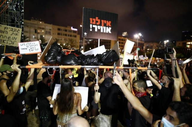 protests have stretched beyond netanyahu s official residence in jerusalem with many israelis gathering on bridges and highway junctions across the country photo reuters file