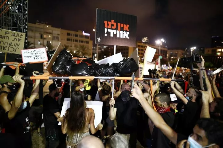 protests have stretched beyond netanyahu s official residence in jerusalem with many israelis gathering on bridges and highway junctions across the country photo reuters file protests have stretched beyond netanyahu s official residence in jerusalem with many israelis gathering on bridges and highway junctions across the country photo reuters file