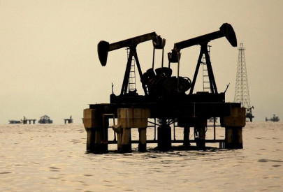 oil prices head for weekly dip as dollar firms