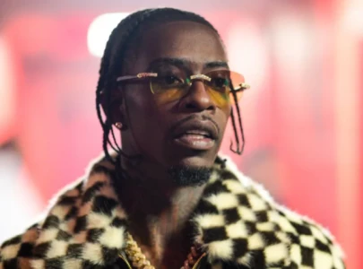 rich homie quan s casket photo goes viral fans react to open funeral