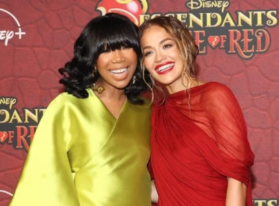 rita ora reveals brandy told her to stop apologizing on descendants the rise of red set rita ora reveals brandy told her to stop apologizing on descendants the rise of red set