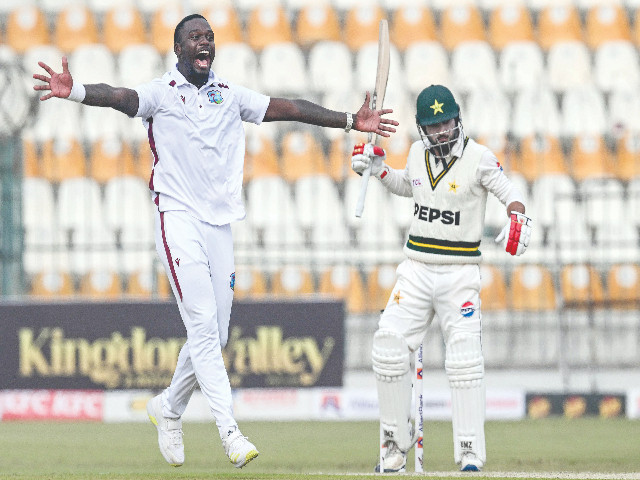 west indies jayden seales l successfully appeals for leg before against pakistan s kamran ghulam r on first day of the first test at multan photo afp