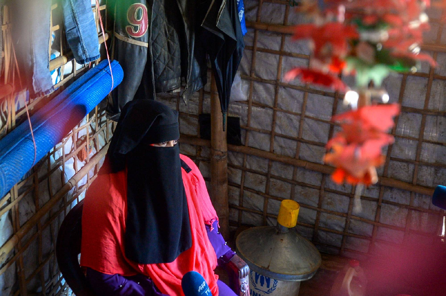 rohingya refugee jannat ara who got married over the phone and tried to migrate by sea to her husband in malaysia speaks during an interview at a refugee camp in bangladesh photo afp