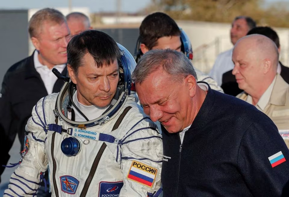 Chief of Russian space agency Roscosmos Yuri Borisov accompanies cosmonaut Oleg Kononenko, who boards the Soyuz MS-24 spacecraft at the Baikonur cosmodrome, Kazakhstan, September 15, 2023. PHOTO: REUTERS