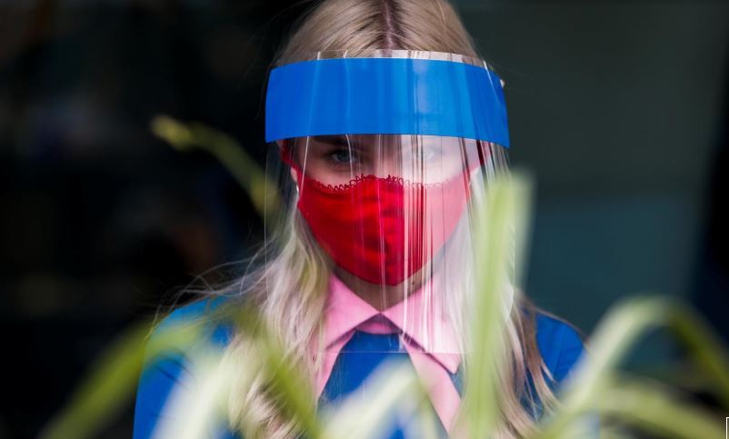 a restaurant employee wears a protective face shield and mask due to the coronavirus disease covid 19 outbreak in moscow russia july 8 2020 photo reuters
