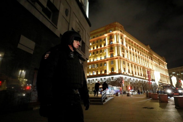 a security officer blocks a street near the federal security service fsb building in moscow photo reuters a security officer blocks a street near the federal security service fsb building in moscow photo reuters