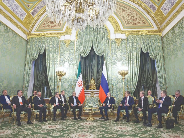 russian president vladimir putin and iranian president masoud pezeshkian meet at the kremlin in moscow photo afp