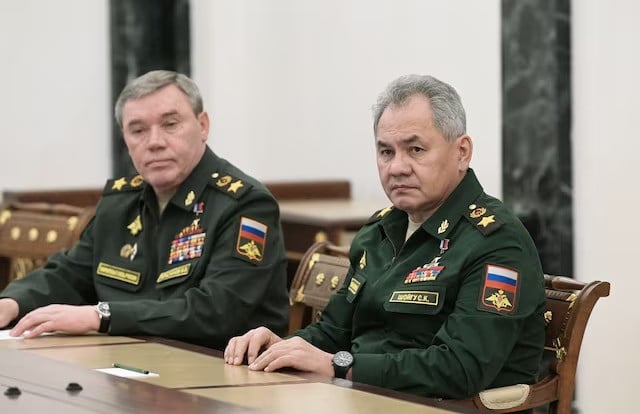 russian defence minister sergei shoigu and chief of the general staff of russian armed forces valery gerasimov attend a meeting photo reuters