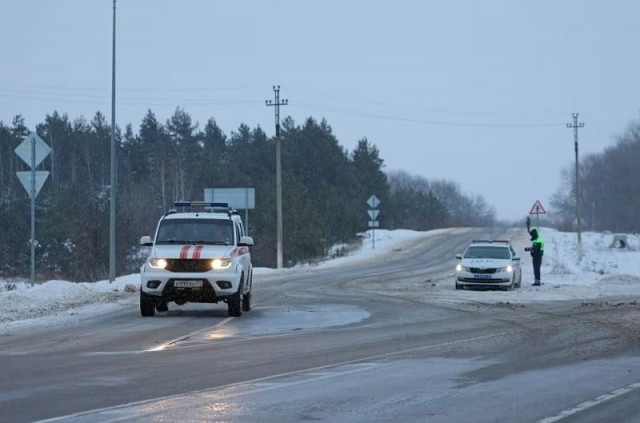 a vehicle of russian emergencies ministry drives along a road near the crash site of the russian ilyushin il 76 military transport plane outside the village of yablonovo in the belgorod region russia january 24 2024 photo reuters a vehicle of russian emergencies ministry drives along a road near the crash site of the russian ilyushin il 76 military transport plane outside the village of yablonovo in the belgorod region russia january 24 2024 photo reuters