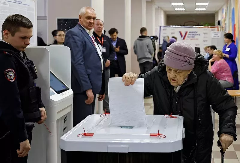 a woman casts her ballot at a polling station during the presidential election in moscow russia march 16 2024 photo reuters