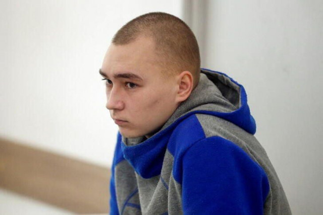 russian soldier vadim shishimarin 21 suspected of violations of the laws and norms of war sits inside a cage during a court hearing amid russia s invasion of ukraine in kyiv ukraine may 23 2022 photo reuters russian soldier vadim shishimarin 21 suspected of violations of the laws and norms of war sits inside a cage during a court hearing amid russia s invasion of ukraine in kyiv ukraine may 23 2022 photo reuters